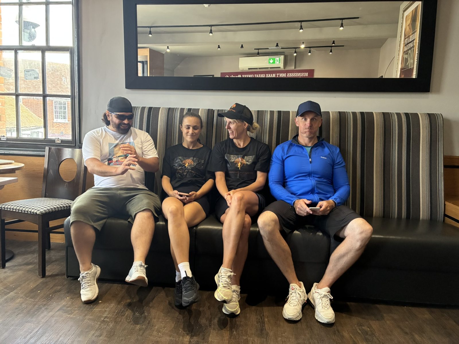 Friends relaxing together after a ruck