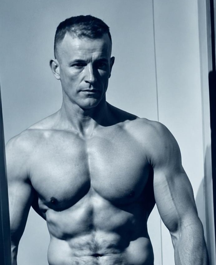 Neil during his earlier years of strength training