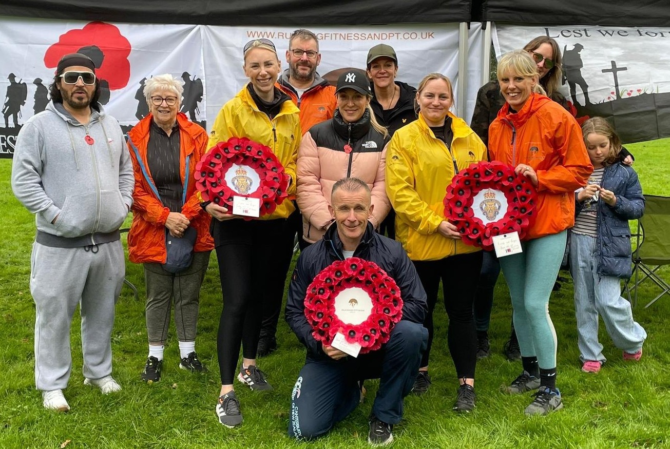 Neil and the Rucking Fitness community with Remembrance Sunday poppy wreaths